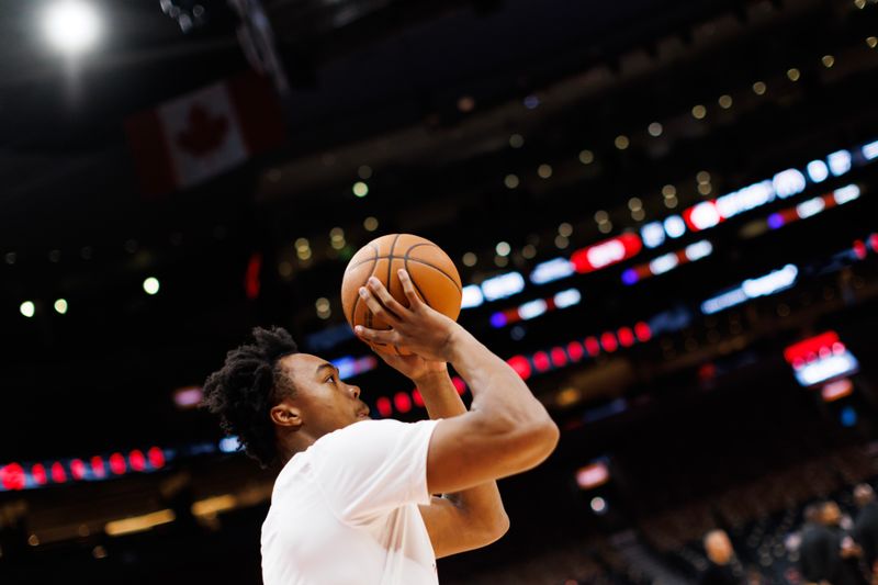 TORONTO, CANADA - OCTOBER 20: Scottie Barnes #4 of the Toronto Raptors warms up ahead of their NBA game against the Washington Wizards at Scotiabank Arena on October 20, 2023 in Toronto, Canada. NOTE TO USER: User expressly acknowledges and agrees that, by downloading and or using this photograph, User is consenting to the terms and conditions of the Getty Images License Agreement. (Photo by Cole Burston/Getty Images)