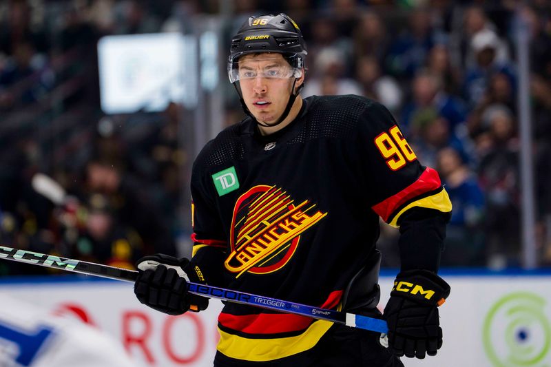 Dec 12, 2023; Vancouver, British Columbia, CAN; Vancouver Canucks forward Andrei Kuzmenko (96) during a stop in play against the Tampa Bay Lightning in the second period at Rogers Arena. Mandatory Credit: Bob Frid-USA TODAY Sports