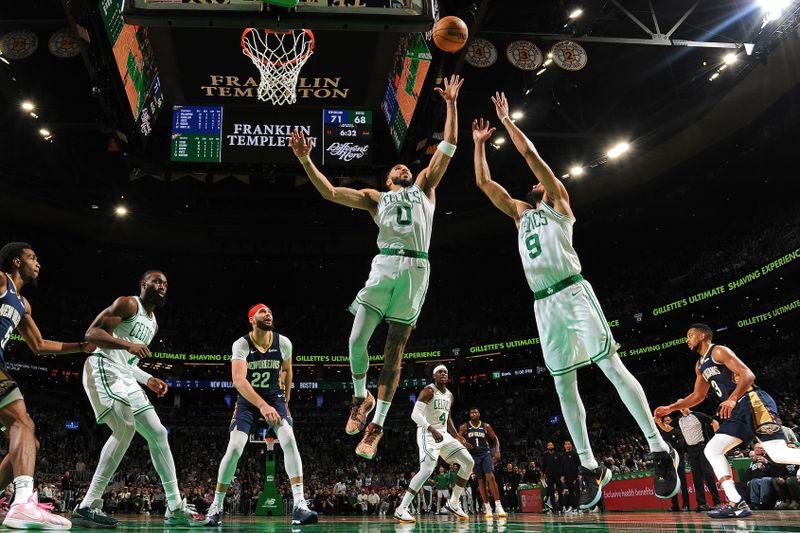 BOSTON, MA - JANUARY 29: Jayson Tatum #0 of the Boston Celtics rebounds during the game against the New Orleans Pelicans on January 29, 2024 at the TD Garden in Boston, Massachusetts. NOTE TO USER: User expressly acknowledges and agrees that, by downloading and or using this photograph, User is consenting to the terms and conditions of the Getty Images License Agreement. Mandatory Copyright Notice: Copyright 2024 NBAE  (Photo by Brian Babineau/NBAE via Getty Images)