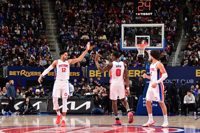 DETROIT, MI - JANUARY 1: Tobias Harris #12 and Jalen Duren #0 of the Detroit Pistons high five during the game against the Orlando Magic on January 1, 2025 at Little Caesars Arena in Detroit, Michigan. NOTE TO USER: User expressly acknowledges and agrees that, by downloading and/or using this photograph, User is consenting to the terms and conditions of the Getty Images License Agreement. Mandatory Copyright Notice: Copyright 2025 NBAE (Photo by Chris Schwegler/NBAE via Getty Images)