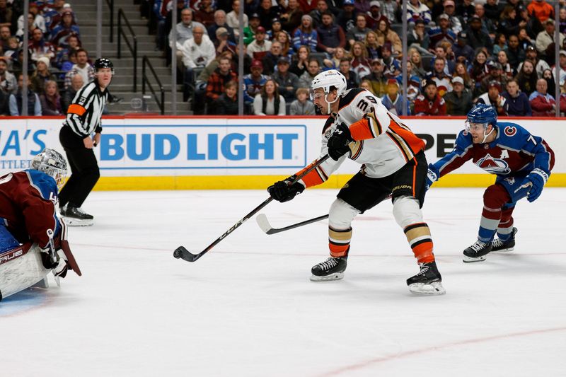 Dec 5, 2023; Denver, Colorado, USA; Anaheim Ducks center Sam Carrick (39) scores a short handed goal against Colorado Avalanche goaltender Alexandar Georgiev (40) as defenseman Devon Toews (7) defends in the third period at Ball Arena. Mandatory Credit: Isaiah J. Downing-USA TODAY Sports