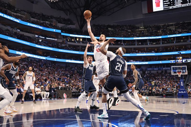 DALLAS, TX - APRIL 28: Ivica Zubac #40 of the LA Clippers shoots the ball during the game against the Dallas Mavericks during Round 1 Game 4 of the 2024 NBA Playoffs on April 28, 2024 at the American Airlines Center in Dallas, Texas. NOTE TO USER: User expressly acknowledges and agrees that, by downloading and or using this photograph, User is consenting to the terms and conditions of the Getty Images License Agreement. Mandatory Copyright Notice: Copyright 2024 NBAE (Photo by Tim Heitman/NBAE via Getty Images)