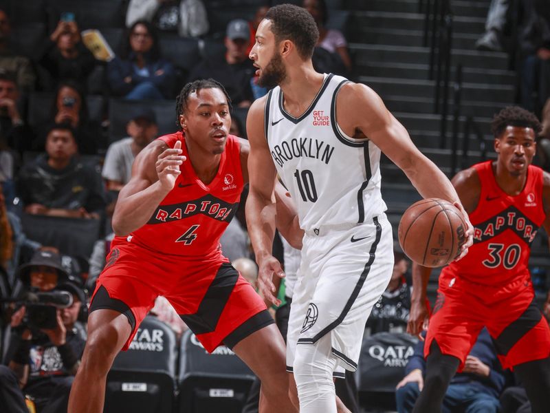 BROOKLYN, NY - OCTOBER 18: Scottie Barnes #4 of the Toronto Raptors defends Ben Simmons #10 of the Brooklyn Nets during the game on October 18, 2024 at Barclays Center in Brooklyn, New York. NOTE TO USER: User expressly acknowledges and agrees that, by downloading and or using this Photograph, user is consenting to the terms and conditions of the Getty Images License Agreement. Mandatory Copyright Notice: Copyright 2024 NBAE (Photo by Nathaniel S. Butler/NBAE via Getty Images)