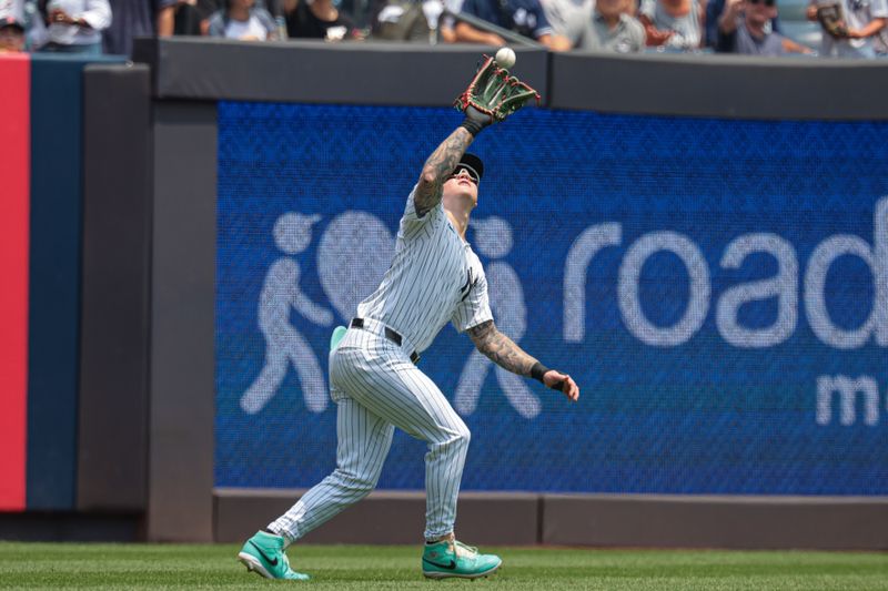 Jul 6, 2024; Bronx, New York, USA; New York Yankees left fielder Alex Verdugo (24) makes a catch for an out during the first inning against the Boston Red Sox at Yankee Stadium. Mandatory Credit: Vincent Carchietta-USA TODAY Sports