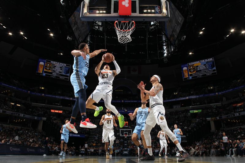 MEMPHIS, TN - NOVEMBER 19: Trey Alexander #23 of the Denver Nuggets drives to the basket during the game against the Memphis Grizzlies during the Emirates NBA Cup game on November 19, 2024 at FedExForum in Memphis, Tennessee. NOTE TO USER: User expressly acknowledges and agrees that, by downloading and or using this photograph, User is consenting to the terms and conditions of the Getty Images License Agreement. Mandatory Copyright Notice: Copyright 2024 NBAE (Photo by Joe Murphy/NBAE via Getty Images)