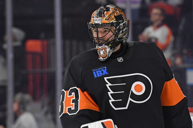 Jan 13, 2025; Philadelphia, Pennsylvania, USA; Philadelphia Flyers goaltender Samuel Ersson (33) against the Florida Panthers during the second period at Wells Fargo Center. Mandatory Credit: Eric Hartline-Imagn Images