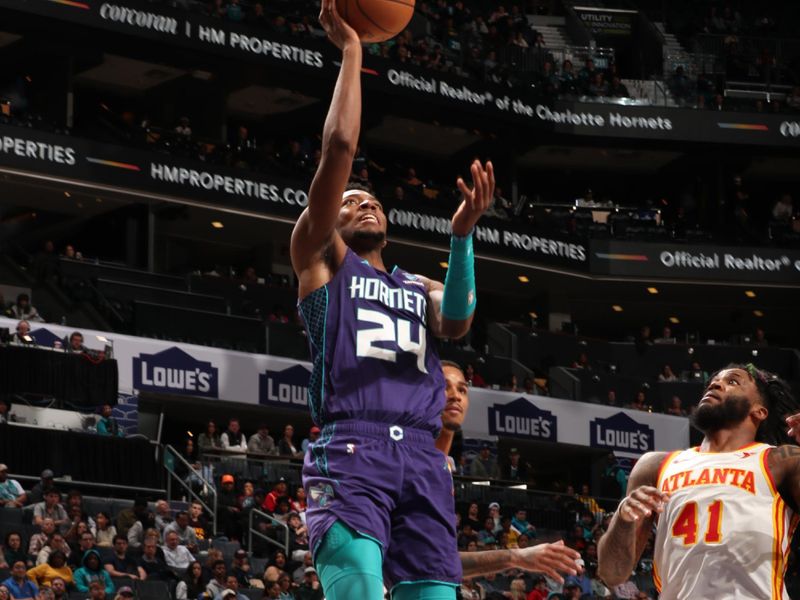 CHARLOTTE, NC - FEBRUARY 14: Brandon Miller #24 of the Charlotte Hornets drives to the basket during the game against the Atlanta Hawks on February 14, 2024 at Spectrum Center in Charlotte, North Carolina. NOTE TO USER: User expressly acknowledges and agrees that, by downloading and or using this photograph, User is consenting to the terms and conditions of the Getty Images License Agreement. Mandatory Copyright Notice: Copyright 2024 NBAE (Photo by Kent Smith/NBAE via Getty Images)