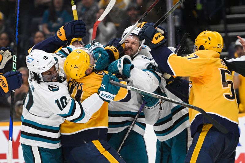 Oct 21, 2023; Nashville, Tennessee, USA; San Jose Sharks and Nashville Predators fight during the second period at Bridgestone Arena. Mandatory Credit: Steve Roberts-USA TODAY Sports