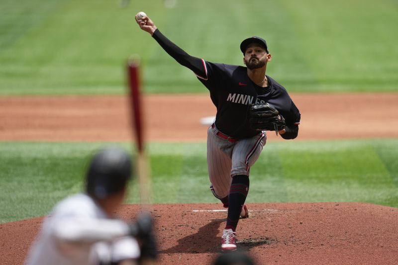 Apr 5, 2023; Miami, Florida, USA;  Minnesota Twins starting pitcher Pablo Lopez (49) pitches against the Miami Marlins in the second inning at loanDepot Park. Mandatory Credit: Jim Rassol-USA TODAY Sports