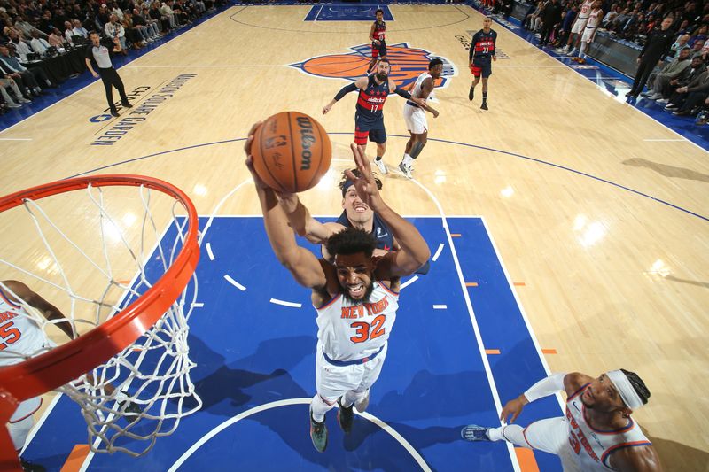 NEW YORK, NY - NOVEMBER 18: Karl-Anthony Towns #32 of the New York Knicks rebounds the ball during the game against the Washington Wizards on November 18, 2024 at Madison Square Garden in New York City, New York.  NOTE TO USER: User expressly acknowledges and agrees that, by downloading and or using this photograph, User is consenting to the terms and conditions of the Getty Images License Agreement. Mandatory Copyright Notice: Copyright 2024 NBAE  (Photo by Nathaniel S. Butler/NBAE via Getty Images)