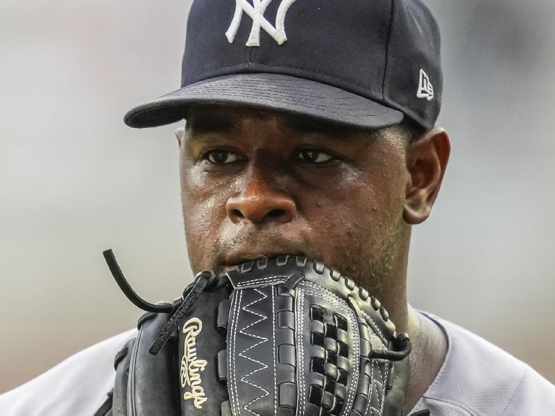 Aug 15, 2023; Cumberland, Georgia, USA; New York Yankees starting pitcher Luis Severino (40) leaves the field during the game against the Atlanta Braves during the first inning at Truist Park. Mandatory Credit: Dale Zanine-USA TODAY Sports