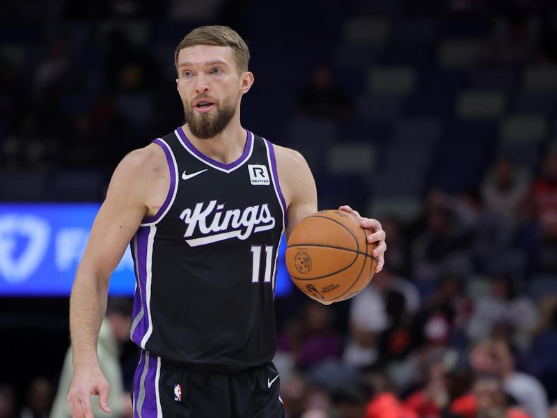 NEW ORLEANS, LOUISIANA - DECEMBER 12: Domantas Sabonis #11 of the Sacramento Kings drives with the ball against the New Orleans Pelicans during a game at the Smoothie King Center on December 12, 2024 in New Orleans, Louisiana. NOTE TO USER: User expressly acknowledges and agrees that, by downloading and or using this Photograph, user is consenting to the terms and conditions of the Getty Images License Agreement. (Photo by Jonathan Bachman/Getty Images)