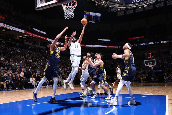 MINNEAPOLIS, MN -  DECEMBER 16: Karl-Anthony Towns #32 of the Minnesota Timberwolves drives to the basket during the game against the Indiana Pacers on December 16 , 2023 at Target Center in Minneapolis, Minnesota. NOTE TO USER: User expressly acknowledges and agrees that, by downloading and or using this Photograph, user is consenting to the terms and conditions of the Getty Images License Agreement. Mandatory Copyright Notice: Copyright 2023 NBAE (Photo by David Sherman/NBAE via Getty Images)