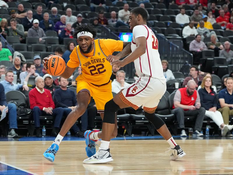 Mar 9, 2023; Las Vegas, NV, USA; Arizona State Sun Devils forward Warren Washington (22) dribbles against USC Trojans forward Joshua Morgan (24) during the first half at T-Mobile Arena. Mandatory Credit: Stephen R. Sylvanie-USA TODAY Sports