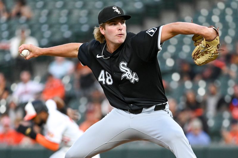 Sep 4, 2024; Baltimore, Maryland, USA;  Chicago White Sox pitcher Jonathan Cannon (48) throwsa pitch as Baltimore Orioles outfielder Cedric Mullins (31) attempts to steal second base at Oriole Park at Camden Yards. Mandatory Credit: Tommy Gilligan -Imagn Images