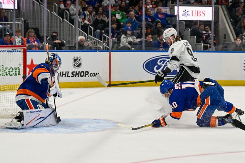 Mar 13, 2026; Elmont, New York, USA; Los Angeles Kings right wing Adrian Kempe (9) scores a goal past New York Islanders goaltender Ilya Sorokin (30) defended by New York Islanders center Brayden Schenn (10) during the first period at UBS Arena. Mandatory Credit: Dennis Schneidler-Imagn Images Mar 13, 2026; Elmont, New York, USA; Los Angeles Kings right wing Adrian Kempe (9) scores a goal past New York Islanders goaltender Ilya Sorokin (30) defended by New York Islanders center Brayden Schenn (10) during the first period at UBS Arena. Mandatory Credit: Dennis Schneidler-Imagn Images