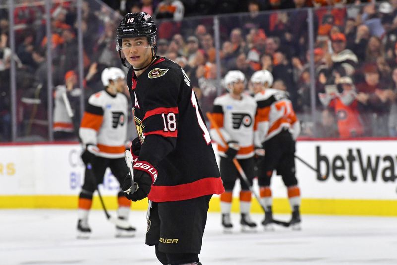 Mar 2, 2024; Philadelphia, Pennsylvania, USA; Ottawa Senators center Tim Stutzle (18) skates away as Philadelphia Flyers celebrate empty net goal during the third period at Wells Fargo Center. Mandatory Credit: Eric Hartline-USA TODAY Sports