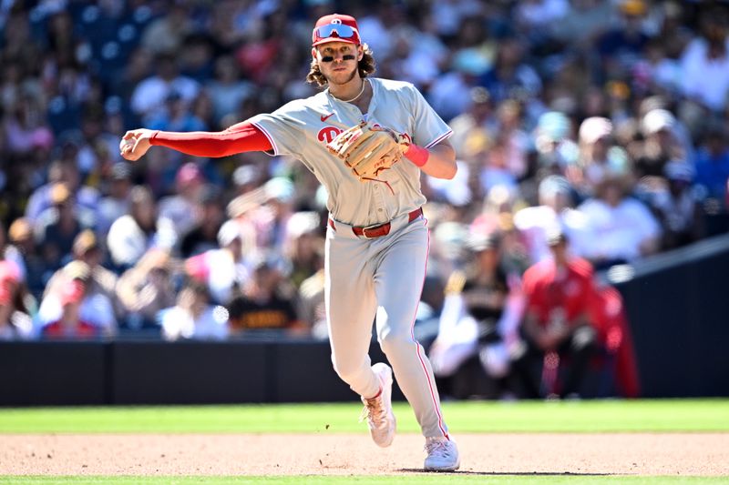 Apr 28, 2024; San Diego, California, USA; Philadelphia Phillies third baseman Alec Bohm (28) throws to first base on a ground out by San Diego Padres shortstop Ha-Seong Kim (not pictured) during the eighth inning at Petco Park. Mandatory Credit: Orlando Ramirez-USA TODAY Sports