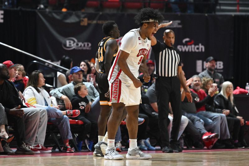 Feb 3, 2024; Las Vegas, Nevada, USA; UNLV Rebels forward Rob Whaley Jr. (5) reacts to a play against the Wyoming Cowboys in the first half at Thomas & Mack Center. Mandatory Credit: Candice Ward-USA TODAY Sports