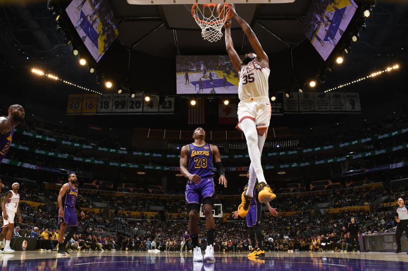 LOS ANGELES, CA - OCTOBER 25: Kevin Durant #35 of the Phoenix Suns shoots the ball during the game against the Los Angeles Lakers on October 25, 2024 at Crypto.Com Arena in Los Angeles, California. NOTE TO USER: User expressly acknowledges and agrees that, by downloading and/or using this Photograph, user is consenting to the terms and conditions of the Getty Images License Agreement. Mandatory Copyright Notice: Copyright 2024 NBAE (Photo by Adam Pantozzi/NBAE via Getty Images)