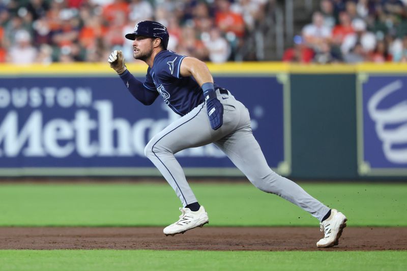 May 31, 2025; Houston, Texas, USA; Tampa Bay Rays right fielder Josh Lowe (15) runs towards second base on a double by left fielder Christopher Morel (not pictured) during the third inning at Daikin Park. Mandatory Credit: Troy Taormina-Imagn Images