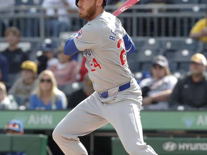 May 12, 2024; Pittsburgh, Pennsylvania, USA;  Chicago Cubs center fielder Cody Bellinger (24) hits an RBI single against the Pittsburgh Pirates during the tenth inning at PNC Park. The Cubs won 5-4 in ten innings. Mandatory Credit: Charles LeClaire-USA TODAY Sports