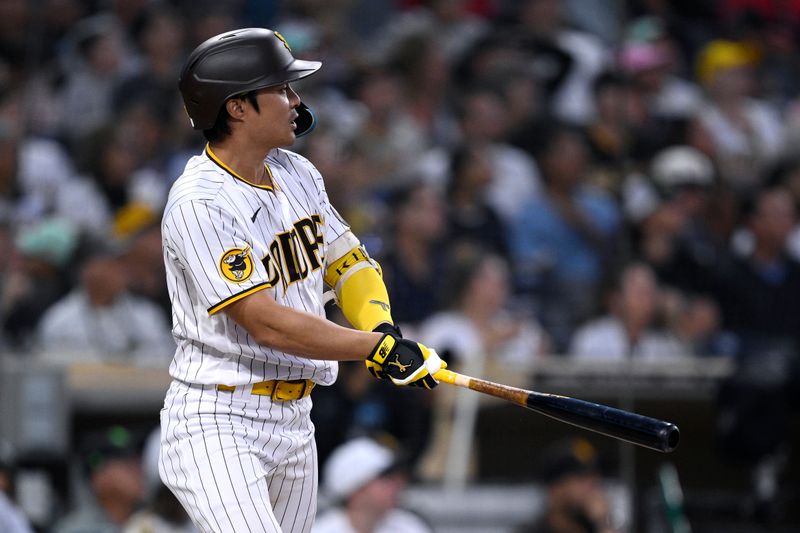 Aug 21, 2023; San Diego, California, USA; San Diego Padres second baseman Ha-seong Kim (7) watches his grand slam home run against the Miami Marlins during the second inning at Petco Park. Mandatory Credit: Orlando Ramirez-USA TODAY Sports