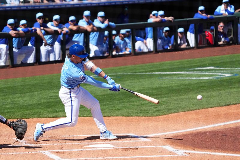 Mar 11, 2024; Surprise, Arizona, USA; Kansas City Royals shortstop Bobby Witt Jr. (7) bats against the San Francisco Giants during the first inning at Surprise Stadium. Mandatory Credit: Joe Camporeale-USA TODAY Sports