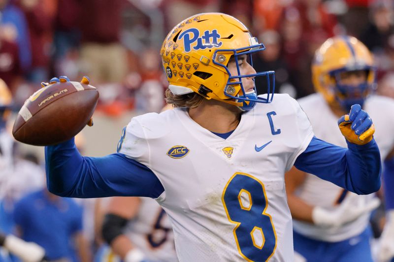 Oct 16, 2021; Blacksburg, Virginia, USA;  Pittsburgh Panthers quarterback Kenny Pickett (8) throws a pass during the second half against the Virginia Tech Hokies at Lane Stadium. Mandatory Credit: Reinhold Matay-USA TODAY Sports