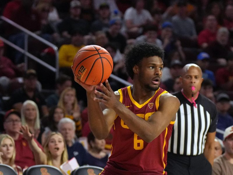 Jan 27, 2024; Los Angeles, California, USA; Southern California Trojans guard Bronny James (6) passes the ball against the UCLA Bruins in the first half at Galen Center. Mandatory Credit: Kirby Lee-USA TODAY Sports