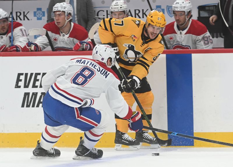 Dec 11, 2025; Pittsburgh, Pennsylvania, USA;  Pittsburgh Penguins center Sidney Crosby (87) moves the puck from Montreal Canadiens defenseman Mike Matheson (8) during the first period at PPG Paints Arena. Mandatory Credit: Philip G. Pavely-Imagn Images