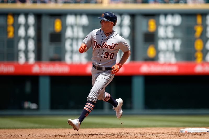 Jul 2, 2023; Denver, Colorado, USA; Detroit Tigers right fielder Kerry Carpenter (30) rounds the bases on a three run home run in the third inning against the Colorado Rockies at Coors Field. Mandatory Credit: Isaiah J. Downing-USA TODAY Sports