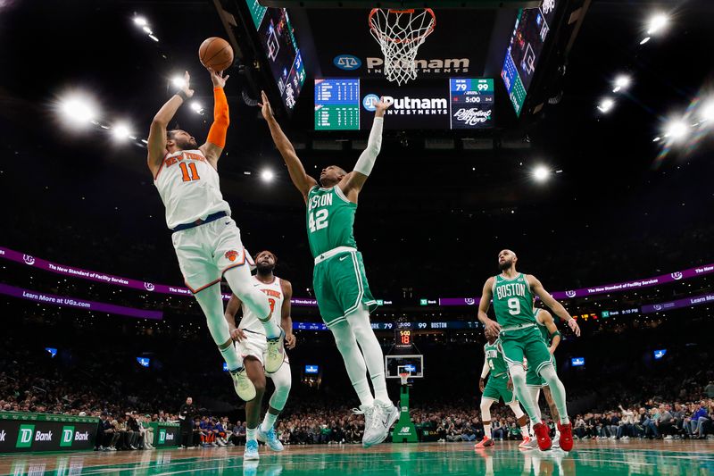 BOSTON, MA - DECEMBER 8: Jalen Brunson #11 of the New York Knicks shoots over Al Horford #42 of the Boston Celtics during the second half at TD Garden on December 8, 2023 in Boston, Massachusetts. NOTE TO USER: User expressly acknowledges and agrees that, by downloading and/or using this Photograph, user is consenting to the terms and conditions of the Getty Images License Agreement. (Photo By Winslow Townson/Getty Images)