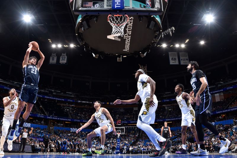ORLANDO, FL - NOVEMBER 13: Tristan da Silva #23 of the Orlando Magic rebounds the ball during the game against the Indiana Pacers on November 13, 2024 at Kia Center in Orlando, Florida. NOTE TO USER: User expressly acknowledges and agrees that, by downloading and or using this photograph, User is consenting to the terms and conditions of the Getty Images License Agreement. Mandatory Copyright Notice: Copyright 2024 NBAE (Photo by Fernando Medina/NBAE via Getty Images)