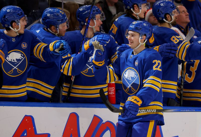 Dec 21, 2023; Buffalo, New York, USA;  Buffalo Sabres right wing Jack Quinn (22) celebrates his goal with teammates during the third period against the Toronto Maple Leafs at KeyBank Center. Mandatory Credit: Timothy T. Ludwig-USA TODAY Sports