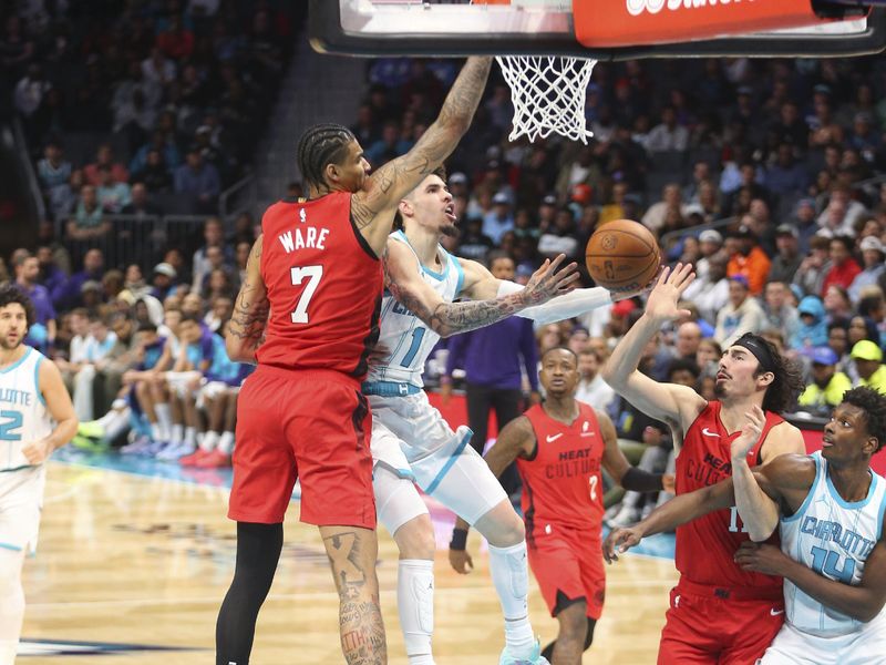 CHARLOTTE, NC - NOVEMBER 27:  LaMelo Ball #1 of the Charlotte Hornets shoots the ball during the game against the Miami Heat on November 27, 2024 at Spectrum Center in Charlotte, North Carolina. NOTE TO USER: User expressly acknowledges and agrees that, by downloading and or using this photograph, User is consenting to the terms and conditions of the Getty Images License Agreement. Mandatory Copyright Notice: Copyright 2024 NBAE (Photo by Kent Smith/NBAE via Getty Images)