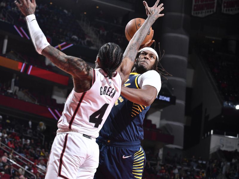 HOUSTON, TX - NOVEMBER 20:  Myles Turner #33 of the Indiana Pacers drives to the basket during the game against the Houston Rockets on November 20, 2024 at the Toyota Center in Houston, Texas. NOTE TO USER: User expressly acknowledges and agrees that, by downloading and or using this photograph, User is consenting to the terms and conditions of the Getty Images License Agreement. Mandatory Copyright Notice: Copyright 2024 NBAE (Photo by Logan Riely/NBAE via Getty Images)