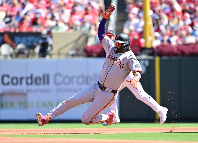 Sep 7, 2025; St. Louis, Missouri, USA;San Francisco Giants shortstop Willy Adames (2) begins his slide into second base to avoid being tagged out by the St. Louis Cardinals at Busch Stadium. Mandatory Credit: Tim Vizer-Imagn Images