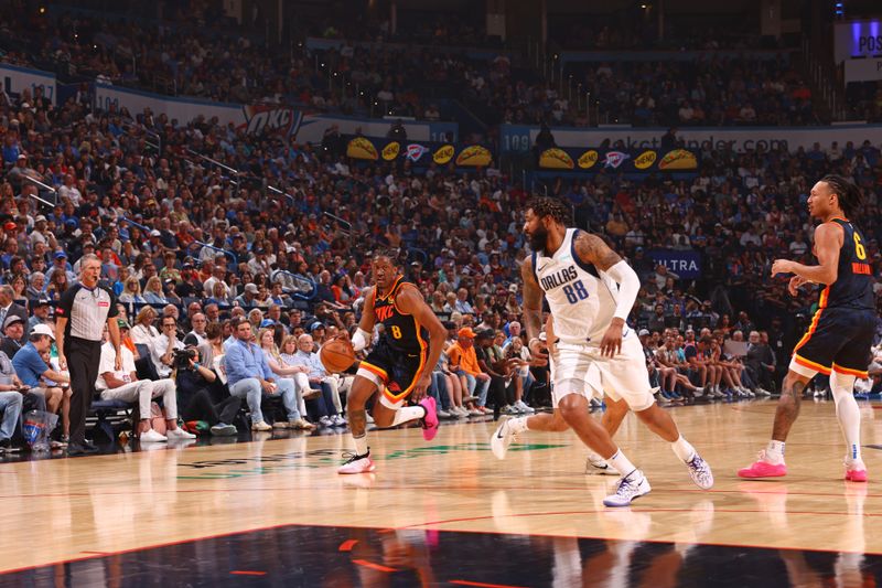 OKLAHOMA CITY, OK - APRIL 14: Jalen Williams #8 of the Oklahoma City Thunder dribbles the ball during the game against the Dallas Mavericks  on April 14, 2024 at Paycom Arena in Oklahoma City, Oklahoma. NOTE TO USER: User expressly acknowledges and agrees that, by downloading and or using this photograph, User is consenting to the terms and conditions of the Getty Images License Agreement. Mandatory Copyright Notice: Copyright 2024 NBAE (Photo by Zach Beeker/NBAE via Getty Images)