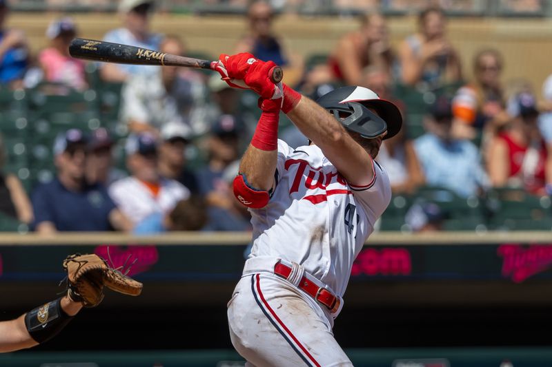 Aug 16, 2023; Minneapolis, Minnesota, USA; Minnesota Twins second baseman Edouard Julien (47) hits a single against the Detroit Tigers in the fourth inning at Target Field. Mandatory Credit: Jesse Johnson-USA TODAY Sports