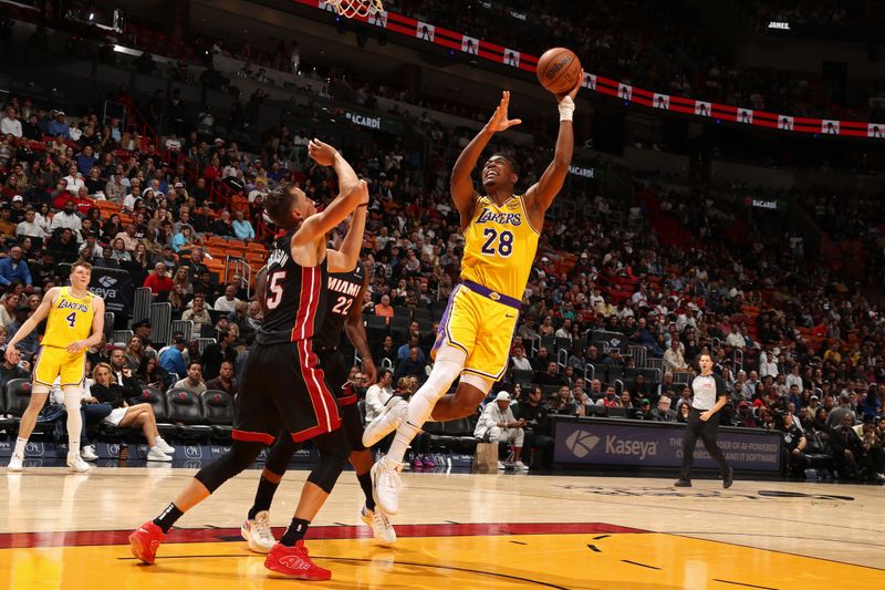 MIAMI, FL - DECEMBER 4: Rui Hachimura #28 of the Los Angeles Lakers shoots the ball during the game against the Miami Heat on December 4, 2024 at Kaseya Center in Miami, Florida. NOTE TO USER: User expressly acknowledges and agrees that, by downloading and or using this Photograph, user is consenting to the terms and conditions of the Getty Images License Agreement. Mandatory Copyright Notice: Copyright 2024 NBAE (Photo by Issac Baldizon/NBAE via Getty Images)