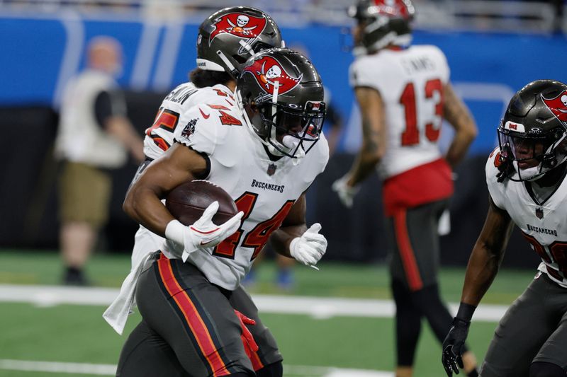 Tampa Bay Buccaneers running back Sean Tucker runs during pregame of an NFL football game against the Detroit Lions, Sunday, Sept. 15, 2024, in Detroit. (AP Photo/Duane Burleson)