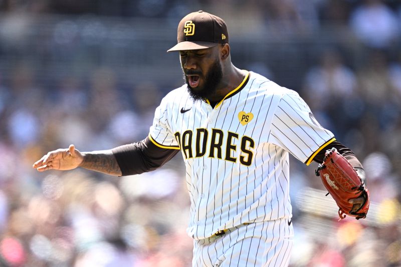 May 1, 2024; San Diego, California, USA; San Diego Padres relief pitcher Enyel De Los Santos (62) reacts after a strikeout to end the top of the seventh inning against the Cincinnati Reds at Petco Park. Mandatory Credit: Orlando Ramirez-USA TODAY Sports