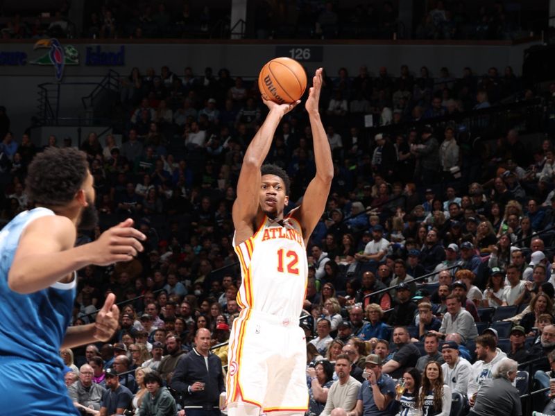 MINNEAPOLIS, MN -  APRIL 12: De'Andre Hunter #12 of the Atlanta Hawks shoots the ball during the game against the Minnesota Timberwolves on April 12, 2024 at Target Center in Minneapolis, Minnesota. NOTE TO USER: User expressly acknowledges and agrees that, by downloading and or using this Photograph, user is consenting to the terms and conditions of the Getty Images License Agreement. Mandatory Copyright Notice: Copyright 2024 NBAE (Photo by David Sherman/NBAE via Getty Images)