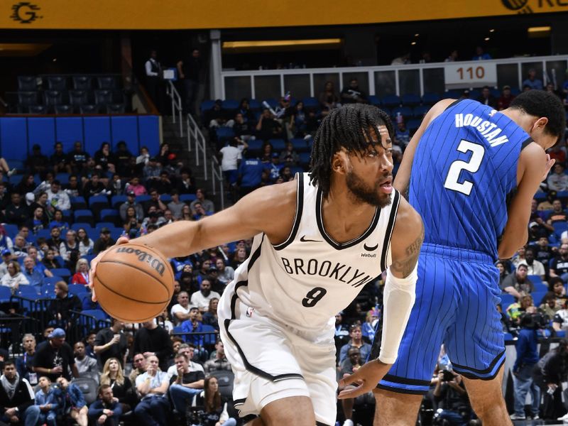 ORLANDO, FL - FEBRUARY 27: Trendon Watford #9 of the Brooklyn Nets drives to the basket during the game against the Orlando Magic on February 27, 2024 at the Kia Center in Orlando, Florida. NOTE TO USER: User expressly acknowledges and agrees that, by downloading and or using this photograph, User is consenting to the terms and conditions of the Getty Images License Agreement. Mandatory Copyright Notice: Copyright 2024 NBAE (Photo by Gary Bassing/NBAE via Getty Images)