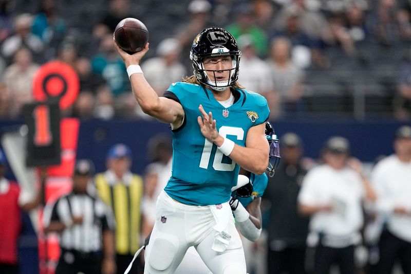 Jacksonville Jaguars quarterback Trevor Lawrence throws a pass during a presesaon NFL football game against the Dallas Cowboys in Arlington, Texas, Saturday, Aug. 12, 2022. (AP Photo/Tony Gutierrez)