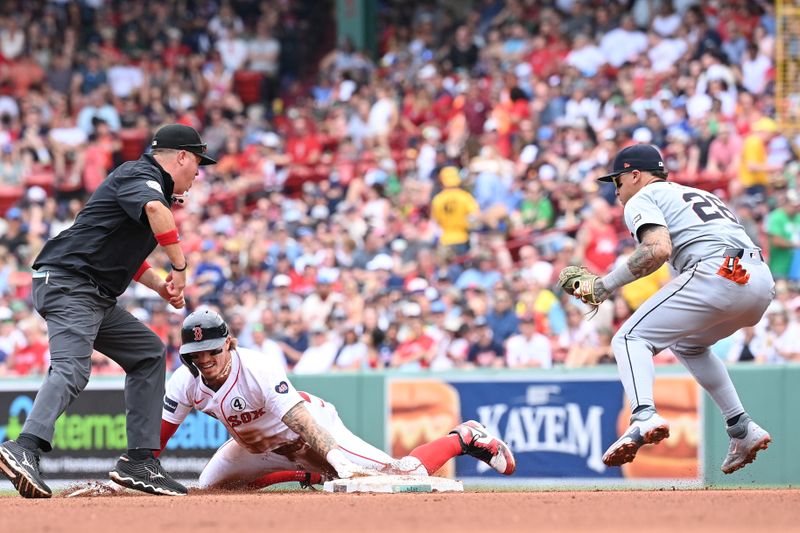 Jun 2, 2024; Boston, Massachusetts, USA;  Boston Red Sox left fielder Jarren Duran (16) is called out by umpire Cory Blaser (89) while stealing second base against Detroit Tigers shortstop Javier Baez (28) during the fourth inning at Fenway Park. Mandatory Credit: Eric Canha-USA TODAY Sports