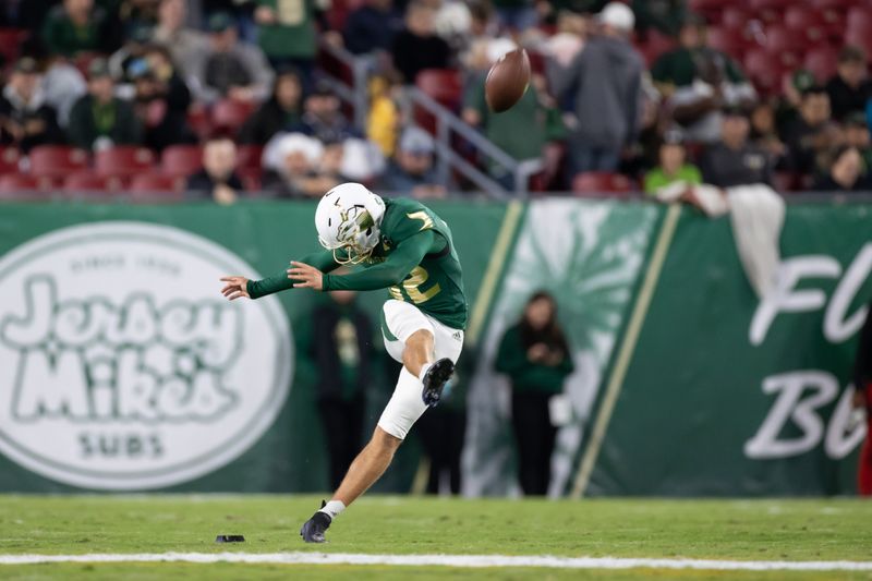 Nov 6, 2021; Tampa, Florida, USA; South Florida Bulls place kicker Spencer Shrader (32) kicks off during the first half against the Houston Cougars at Raymond James Stadium. Mandatory Credit: Matt Pendleton-USA TODAY Sports