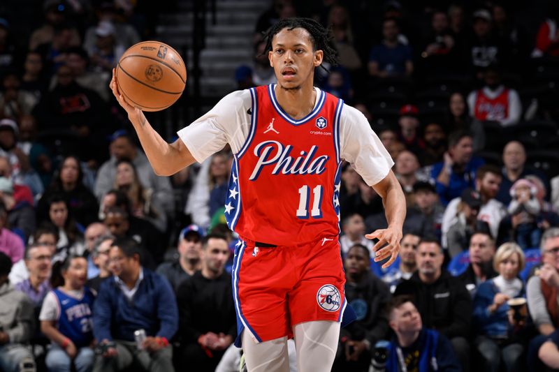 ATLANTA, GA - MARCH 14:  Jeff Dowtin Jr. #11 of the Philadelphia 76ers handles the ball during the game against the Indiana Pacers on March 14, 2025 at State Farm Arena in Atlanta, Georgia.  NOTE TO USER: User expressly acknowledges and agrees that, by downloading and/or using this Photograph, user is consenting to the terms and conditions of the Getty Images License Agreement. Mandatory Copyright Notice: Copyright 2025 NBAE (Photo by Adam Hagy/NBAE via Getty Images)