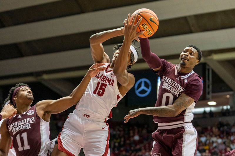 Jan 25, 2023; Tuscaloosa, Alabama, USA; Mississippi State Bulldogs forward D.J. Jeffries (0) blocks the shot of Alabama Crimson Tide forward Noah Clowney (15) during the first half at Coleman Coliseum. Mandatory Credit: Marvin Gentry-USA TODAY Sports